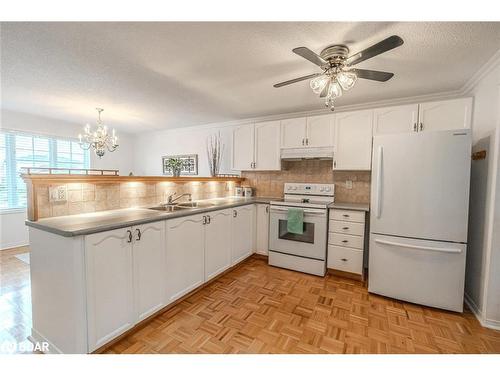 27 Waddington Crescent, Barrie, ON - Indoor Photo Showing Kitchen With Double Sink