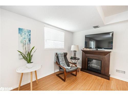 27 Waddington Crescent, Barrie, ON - Indoor Photo Showing Other Room With Fireplace