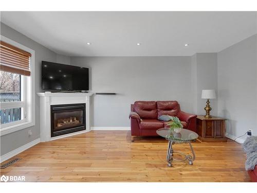 3 Logan Court, Barrie, ON - Indoor Photo Showing Living Room With Fireplace