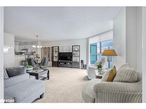 605-150 Dunlop Street E, Barrie, ON - Indoor Photo Showing Living Room