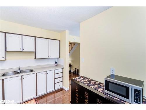 J5-63 Ferris Lane, Barrie, ON - Indoor Photo Showing Kitchen With Double Sink