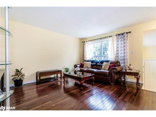 J5-63 Ferris Lane, Barrie, ON - Indoor Photo Showing Living Room With Fireplace