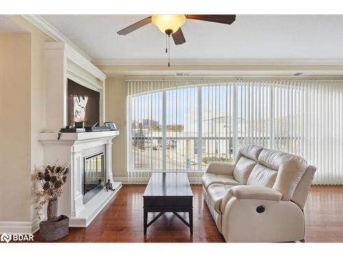 402-160 Macdonell Street, Guelph, ON - Indoor Photo Showing Living Room With Fireplace