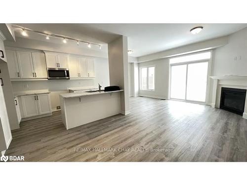 7 Churchlea Mews, Orillia, ON - Indoor Photo Showing Other Room With Fireplace