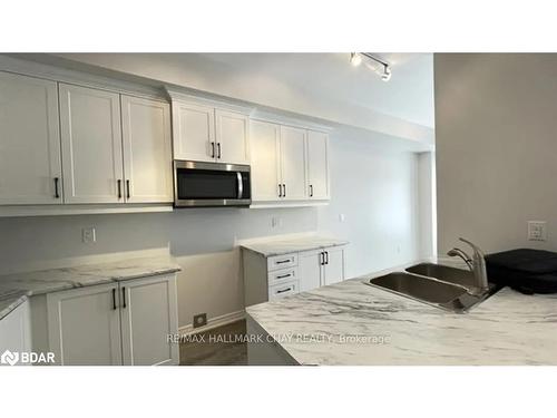 7 Churchlea Mews, Orillia, ON - Indoor Photo Showing Kitchen With Double Sink