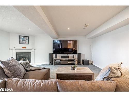 20 Jagges Drive, Barrie, ON - Indoor Photo Showing Living Room With Fireplace