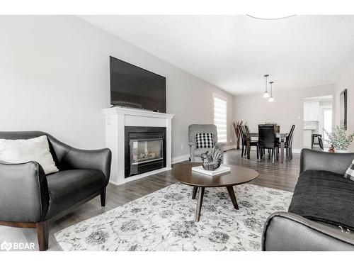 279 Anne Street N, Barrie, ON - Indoor Photo Showing Living Room With Fireplace