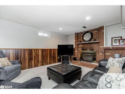 279 Anne Street N, Barrie, ON - Indoor Photo Showing Living Room With Fireplace