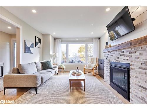 64 Bradley Boulevard, Mitchell'S Corners, ON - Indoor Photo Showing Living Room With Fireplace