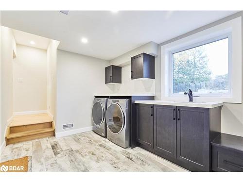 64 Bradley Boulevard, Mitchell'S Corners, ON - Indoor Photo Showing Laundry Room