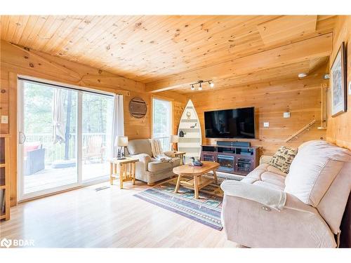 1472 Otter Point Road, Coldwater, ON - Indoor Photo Showing Living Room With Fireplace