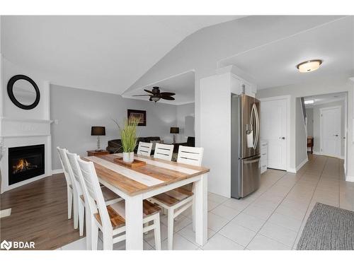 1112 Kell Street, Innisfil, ON - Indoor Photo Showing Dining Room With Fireplace