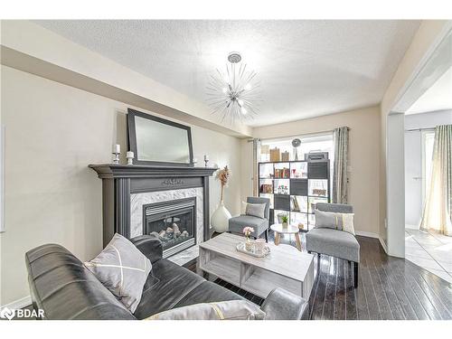 2100 Osbond Road, Innisfil, ON - Indoor Photo Showing Living Room With Fireplace