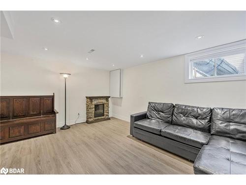 85 Elizabeth Street, Barrie, ON - Indoor Photo Showing Living Room With Fireplace