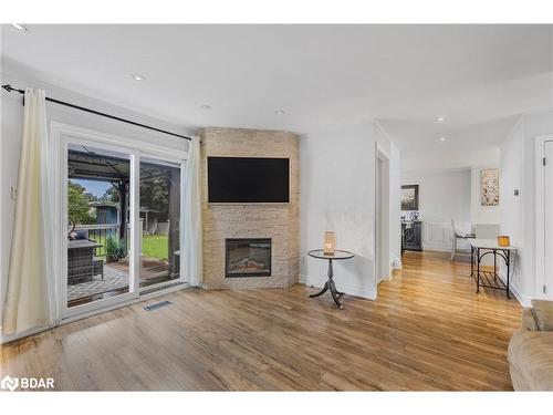 85 Elizabeth Street, Barrie, ON - Indoor Photo Showing Living Room With Fireplace