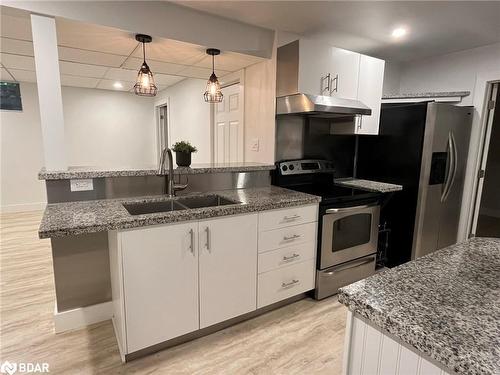 Lower-23 Free Drive, Orillia, ON - Indoor Photo Showing Kitchen With Double Sink