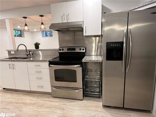 Lower-23 Free Drive, Orillia, ON - Indoor Photo Showing Kitchen With Double Sink With Upgraded Kitchen