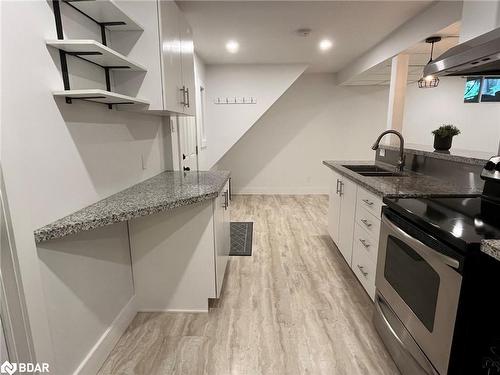 Lower-23 Free Drive, Orillia, ON - Indoor Photo Showing Kitchen With Double Sink