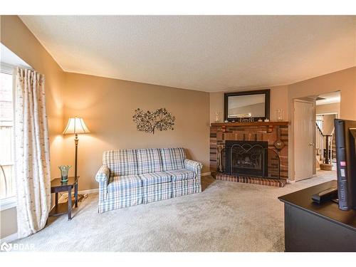 50-165 Kozlov Street, Barrie, ON - Indoor Photo Showing Living Room With Fireplace