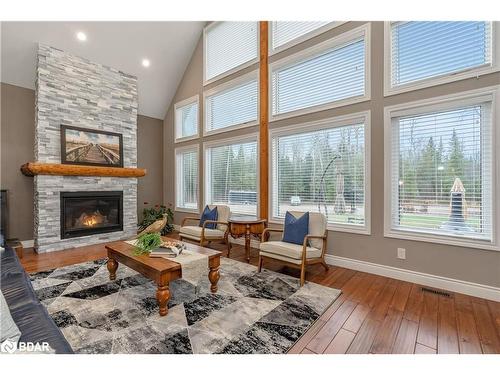 6605 County Road 21, Essa, ON - Indoor Photo Showing Living Room With Fireplace