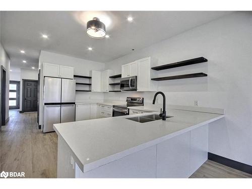 A-23 Gray Street, Coldwater, ON - Indoor Photo Showing Kitchen With Double Sink With Upgraded Kitchen