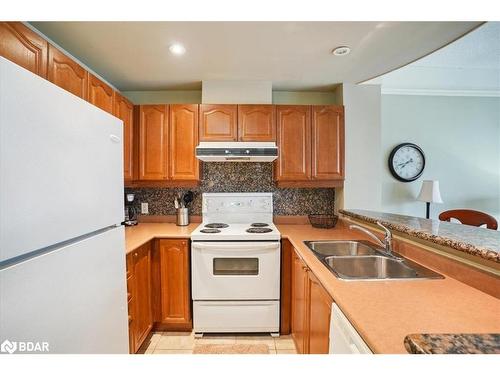 1507-2 Toronto Street, Barrie, ON - Indoor Photo Showing Kitchen With Double Sink