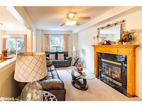 56 Stoneybrook Crescent, Barrie, ON - Indoor Photo Showing Living Room With Fireplace