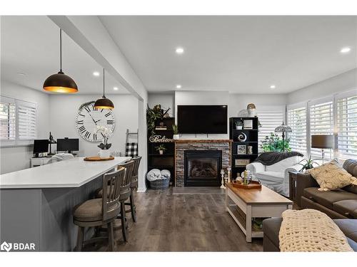 1551 Gill Road, Midhurst, ON - Indoor Photo Showing Living Room With Fireplace