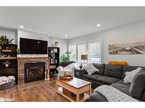 1551 Gill Road, Midhurst, ON - Indoor Photo Showing Living Room With Fireplace