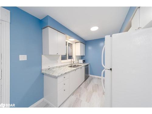 151 Cundles Road E, Barrie, ON - Indoor Photo Showing Kitchen With Double Sink