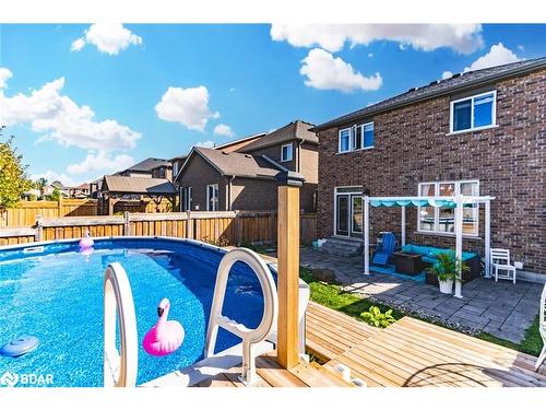 82 Nathan Crescent, Barrie, ON - Outdoor With Above Ground Pool With Deck Patio Veranda