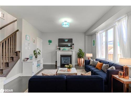 82 Nathan Crescent, Barrie, ON - Indoor Photo Showing Living Room With Fireplace