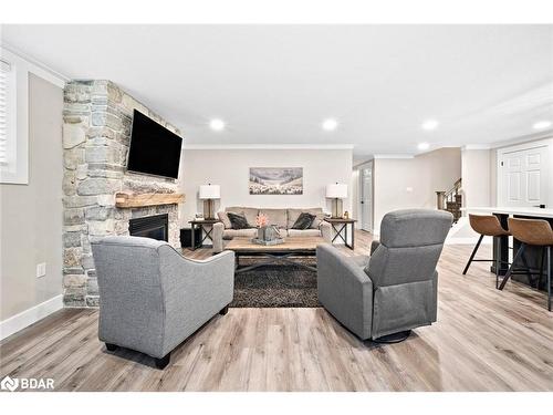 8 Crystalwood Lane, Midhurst, ON - Indoor Photo Showing Living Room With Fireplace