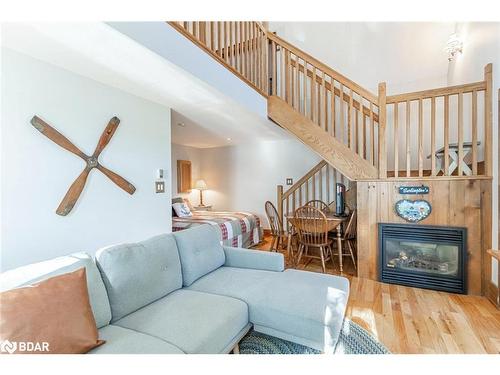 3978 South Portage Road, Lake Of Bays, ON - Indoor Photo Showing Living Room With Fireplace