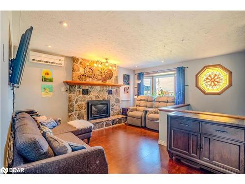 125 Hoyt Avenue, Victoria Harbour, ON - Indoor Photo Showing Living Room With Fireplace