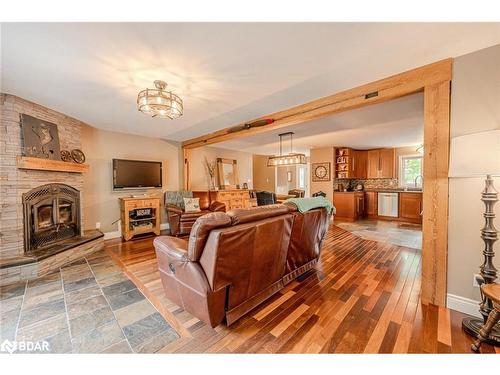 8071 4Th Line, Angus, ON - Indoor Photo Showing Living Room With Fireplace