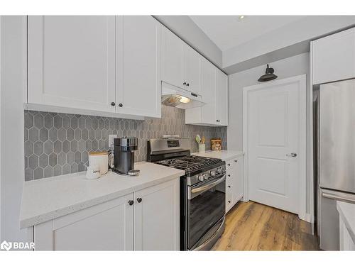 21 Moreau Way, Springwater, ON - Indoor Photo Showing Kitchen