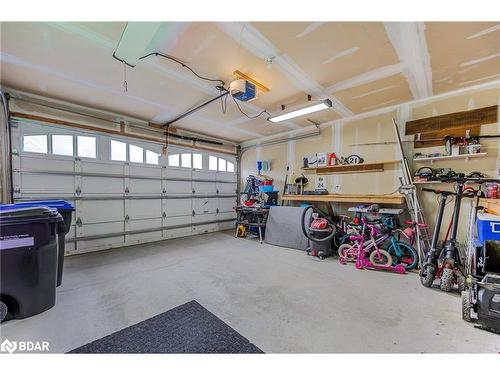 21 Moreau Way, Springwater, ON - Indoor Photo Showing Garage