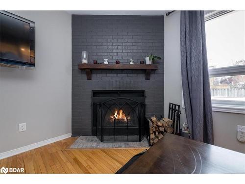 9 Cuthbert Street, Barrie, ON - Indoor Photo Showing Living Room With Fireplace