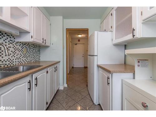 103-414 Blake Street, Barrie, ON - Indoor Photo Showing Kitchen With Double Sink