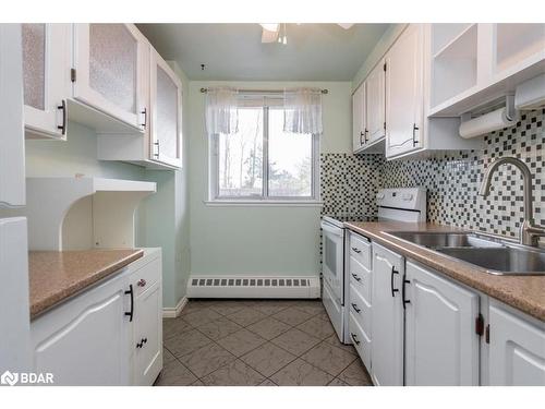 103-414 Blake Street, Barrie, ON - Indoor Photo Showing Kitchen With Double Sink