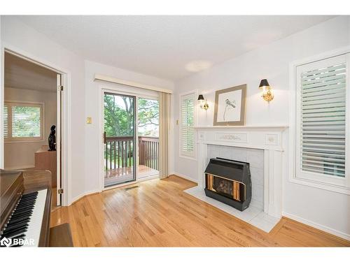 9 Briarwood Drive, Alliston, ON - Indoor Photo Showing Living Room With Fireplace