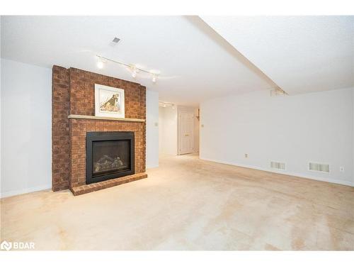 9 Briarwood Drive, Alliston, ON - Indoor Photo Showing Living Room With Fireplace