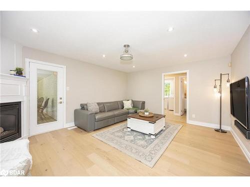 70 Copeland Creek Drive, Tiny, ON - Indoor Photo Showing Living Room With Fireplace