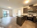 304-95 Dundas Street W, Oakville, ON  - Indoor Photo Showing Kitchen With Upgraded Kitchen 