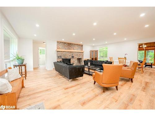 1755 Golf Link Road, Tiny, ON - Indoor Photo Showing Living Room With Fireplace