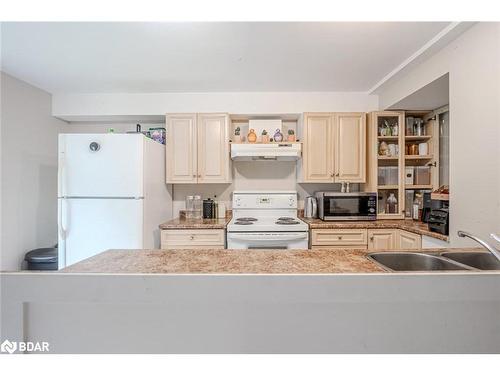 Lower-69 Moir Crescent, Barrie, ON - Indoor Photo Showing Kitchen With Double Sink