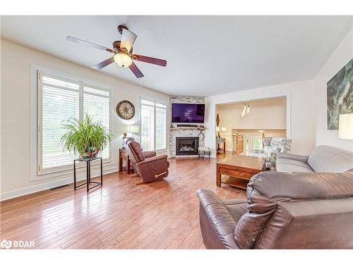 1104 Alfred Street, Innisfil, ON - Indoor Photo Showing Living Room With Fireplace