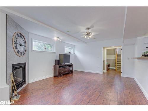 1104 Alfred Street, Innisfil, ON - Indoor Photo Showing Living Room With Fireplace