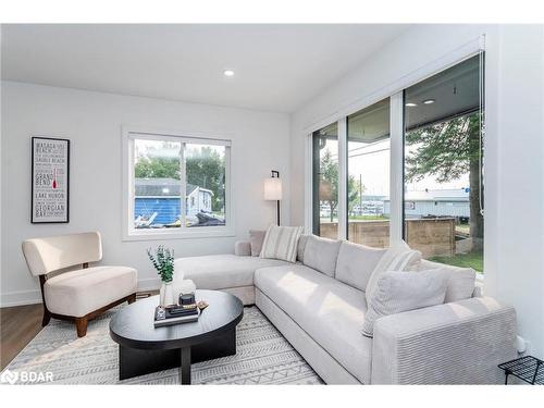 205 Hoyt Avenue, Tay, ON - Indoor Photo Showing Living Room With Fireplace